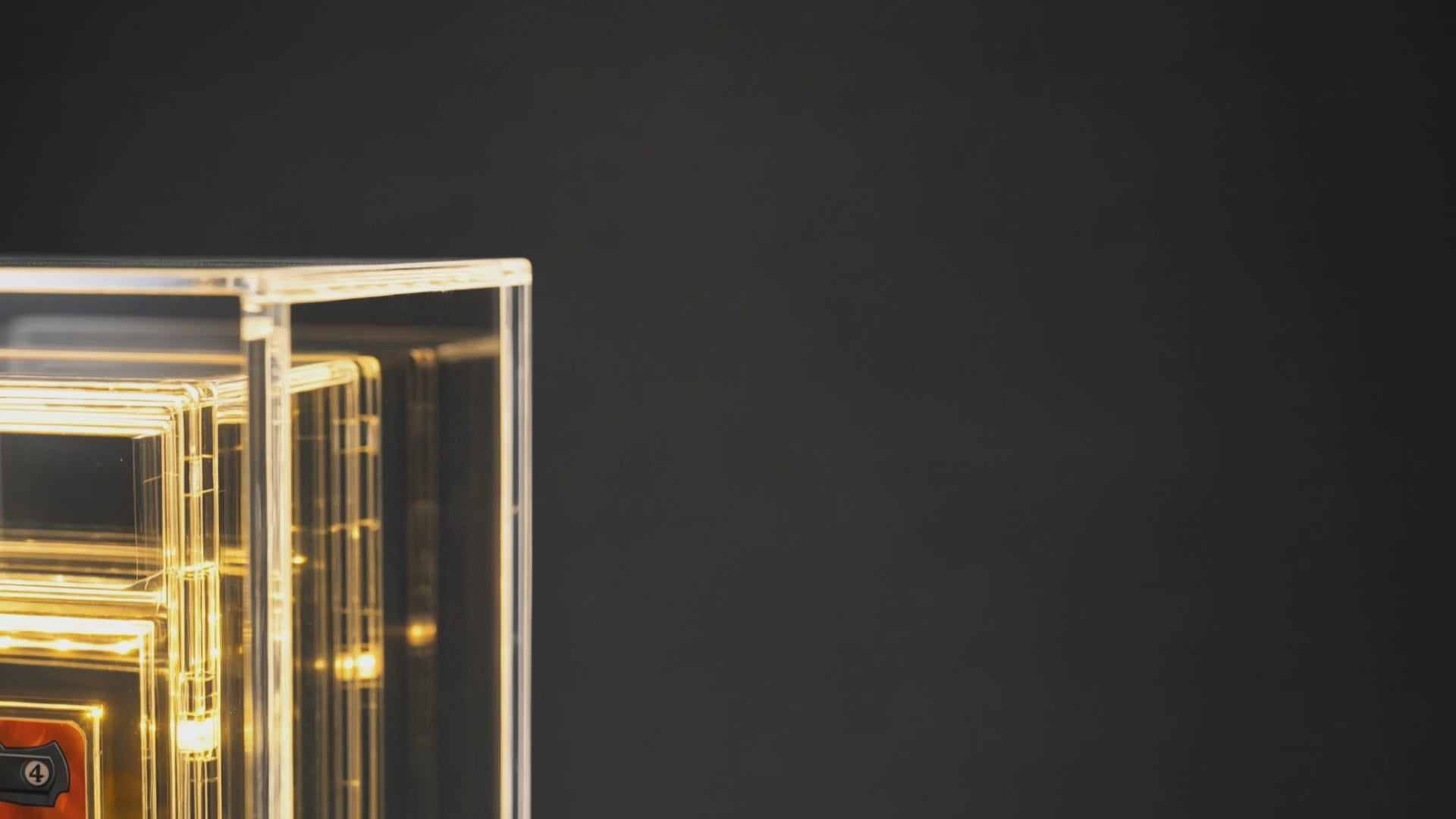 動画を読み込むARCANIA wooden LED PSA trading card display stand illuminating a protected card in an acrylic case.